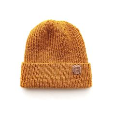 Brighten up your adventures with this handcrafted mustard yellow fisherman cap. Designed for the active man who loves the outdoors, it's the perfect blend of style and comfort. Embrace the vibrant life with a hat that's as bold as you are! 𝗙𝗘𝗔𝗧𝗨𝗥𝗘𝗦 - Winter knit beanie - Mustard yellow yarn (100% Acrylic) - Fits: ADULT SIZE - Sizes: 12.99"/33cm (Total length) x 18.9"/48cm till 27.56"/70cm (Band Width, all around your head) - Production Method: Knit - ID number: CGB0582 𝗧𝗛𝗜𝗦 𝗜𝗧𝗘𝗠 𝗪𝗜𝗟𝗟 𝗕𝗘 𝗦𝗛𝗜𝗣𝗣𝗘𝗗 𝗜𝗡 𝟮 𝗧𝗢 𝟱 𝗕𝗨𝗦𝗜𝗡𝗘𝗦𝗦 𝗗𝗔𝗬𝗦! 𝗕𝗮𝗰𝗸 𝘁𝗼 𝗖𝗼𝗮𝘀𝘁𝗟𝗮𝗻𝗱 𝗦𝘁𝗿𝗲𝗲𝘁𝘄𝗲𝗮𝗿 𝘀𝗵𝗼𝗽: http://www.etsy.com/shop/CoastLandStreetwear 𝗪𝗼𝗺𝗲𝗻'𝘀 𝘀𝗵𝗼𝗽: http://www.etsy.com/shop/NOTONbyRaquel 𝗞𝗶𝗱'𝘀 𝘀𝗵𝗼𝗽: http://www.etsy.com/shop/NOTONbyRaqu Mustard Wool Hat, Streetwear Shop, Yellow Knit, Winter Knits, Mustard Yellow, Skull Cap, Knit Beanie, Mustard, Caps Hats