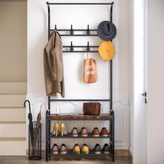 a coat rack with shoes and hats on it