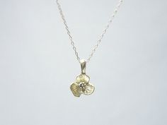 Gold flower necklace- simple dainty necklaceThree petal flower charm hangs on a dainty 14K gold filled chain.  Simple and dainty jewelry, a great everyday necklace.>>>measurements<< Delicate Flower Charm Necklaces For Everyday, Everyday Delicate Flower Charm Necklaces, Everyday Delicate Flower Charm Necklace, Delicate Silver Charm Necklace In 14k Gold Filled, Delicate Silver Charm Necklace In 14k Gold-filled, Dainty Rose Gold Flower Necklace, Delicate Necklace With Flower Charm, Delicate Flower Pendant Necklace, Tiny Delicate Pendant Charm Necklace