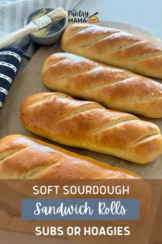 soft sourdough sandwich rolls on parchment paper with text overlay reading soft sourdough sandwich rolls subs o hoagies