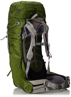 a large green backpack sitting on top of a white floor