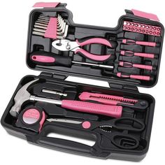 a pink and black tool kit with tools in it