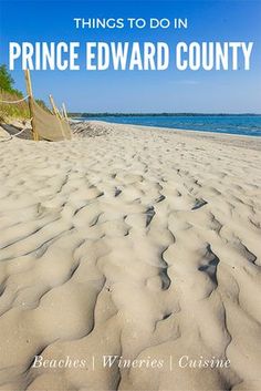 the beach is covered in white sand and there are two chairs sitting on it with text overlay that reads things to do in prince edward county