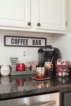 a coffee bar with candy canes on the counter