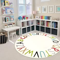 a child's playroom with bookshelves and toys