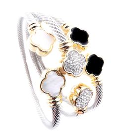 PRICES MAY VARY. END TIPS: 12mm Width TWISTING CABLE BAND: 5mm Width OPENING MEASURES: 7.5 Inches Long ❤ CHIC & STYLISH: Classic Unique Style! This amazing gorgeous twisting cable cuff bracelet features ornately crafted 18kt gold plated clover flower end tips available in black onyx, mother of pearl shell & shimmery pave crystals. It effortlessly slips onto your wrist with comfort and looks rich and sophisticated! Gorgeously crafted with intricate styling & detailing, this cuff bracelet makes a Trendy Accessories 2024, Trending Bracelets 2024, Trending Jewelry 2024, Jewelry Trends 2024, Cuff Bracelets Gold, Dope Jewelry Accessories, Amazon Jewelry, Creative Shoes, Clover Flower