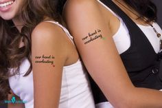 two beautiful young women with tattoos on their arms