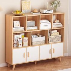 a book shelf with books and magazines on it