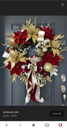 a red and gold christmas wreath on a door