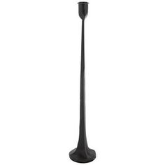 a black floor lamp on a white background