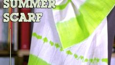 a green and white tie - dyed scarf with the words summer scarf on it