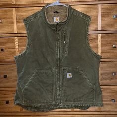 Soothing Sage Green Mock Neck Carhartt Vest (With Sherpa Lining) Gently Distressed With Gorgeous Fade. This Looker Has Three Exterior Pockets (One Zippered) And Two Inside Velcro Pockets. All Zippers Original And In Perfect Condition. Has A Drop Bottom On Back For Extra Warmth And Coverage. Sanitized For Your Peace Of Mind. Perfect For Layering! Carhartt Vest, Carhartt Jackets, Carhartt Women, Sherpa Lined, Winter Fits, Jackets & Coats, Jackets For Women, Fashion Inspo, My Style