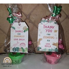 two bags with thank you for stopping by love belia tags attached to each bag