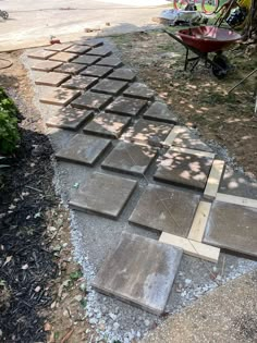 an outdoor walkway made out of concrete blocks