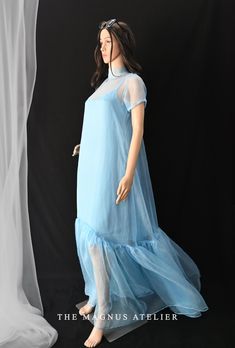 Elevate your wardrobe with our Women's Blue Long Organza Dress, a stunning blend of elegance and boho charm, perfect for special occasions and summer weddings. Feel the lightness of the organza fabric as it flows gracefully with every step. Key Features: - Beautiful blue organza fabric for a dreamy look - Flattering long design, ideal for various body types - Boho style with delicate details that stand out - Perfect for weddings, parties, or any special event Crafted with care, this dress ensures comfort without compromising style. Our sizing options cater to all, and we offer customization to make it uniquely yours. Made with sustainable practices, it's an eco-friendly choice you can feel good about. Dress concerns? Our customers love the soft feel and breathability. Plus, it's easy to ca Summer Prom Gown In Organza, Bohemian Organza Summer Dress, Blue Short Sleeve Maxi Dress For Prom, Sheer Flowy Maxi Dress For Wedding, Blue Flowy Dress For Wedding, Sheer Maxi Dress For Summer Prom, Summer Bohemian Organza Dress, Bridesmaid Maxi Length Organza Dresses, Bridesmaid Organza Maxi Dresses