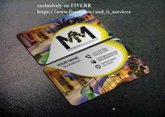 two business cards sitting on top of each other with the letter m in front of them