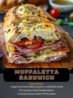 a sub sandwich on a cutting board with ingredients around it and the words muffalettta sandwich