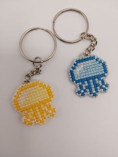 two keychains made to look like pixel art