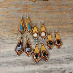 Check out this item in my Etsy shop https://www.etsy.com/listing/1448358146/handmade-tooled-leather-earrings-with Leather Monogrammed Earrings, Artisan Hand-tooled Teardrop Earrings, Artisan Brown Teardrop Earrings, Artisan Brown Earrings With Natural Stones, Handmade Southwestern Leather Earrings, Unique Hand-tooled Teardrop Earrings, Artisan Handcrafted Brown Jewelry, Southwestern Hand-tooled Earrings As Gift, Southwestern Hand Tooled Earrings As Gift