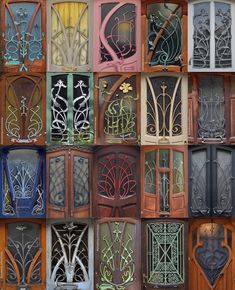 an assortment of wooden doors with intricate designs on them, all in different colors and sizes