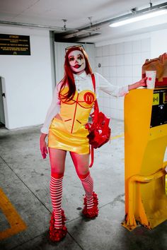 a woman dressed up as a mcdonald's character