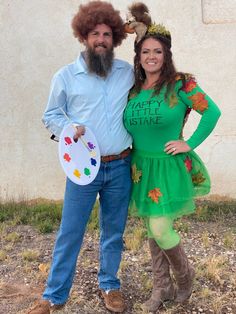 a man and woman dressed up in costumes