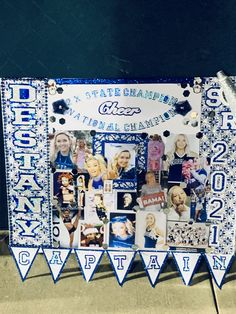 a blue and white banner with pictures on it