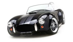 a black and white sports car is shown