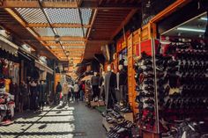 an open air market with lots of shoes on display