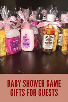 baby shower game gifts for guests on the table with text overlay that reads, baby shower game gifts for guests