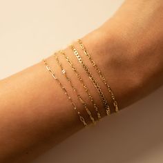 Dainty and masculine, this Gucci Marina Italian chain has an intricate link design. Perfect accessory to stack bracelets. 14K Solid Gold Italian Gucci Marina chain, width 1.5mm Length options in pull-down menu Handcrafted in NYC Hypoallergenic, lead and nickel free #BS029 Bracelet Combo, Gucci Bracelet, Italian Gold Jewelry, Cuban Chain Bracelet, Italian Bracelet, Italian Chain, Stack Bracelets, Link Design, Italian Jewelry