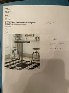 a piece of paper with an image of a table and two stools