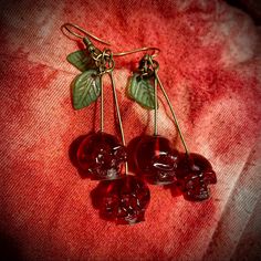 Handmade Resin & Metal Alloy Red Cherry Skull Earrings These Will Stand Out All Year Round - !! I Just Gave A Pair To My Friend For Her Birthday - She Put Them On And Didn’t Take Them Offand Of Course Offered To Model New To Posh!?!? Get $10 To Shop On Me!!! Use Code Heidigg9089 And Sign Up Today Jewelry Gore, Edgy Red Earrings As Gift, Edgy Red Earrings For Gift, Edgy Red Earrings For Gifts, Handmade Punk Red Jewelry, Handmade Red Punk Jewelry, Vintage Skull Print Jewelry For Gift, Vintage Skull Print Jewelry As Gift, Vintage Skull Print Jewelry Gift