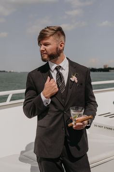 Groom on wedding day with Detroit Infinity Ovation yacht wedding charters. Groom On Wedding Day, Lillian West, First Dance Songs