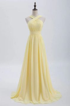 Dress your bridesmaids in elegance with our Elegant Chiffon A-Line Sleeveless Bridesmaid Dress. Made from high-quality chiffon, this dress exudes sophistication and grace. The A-line silhouette flatters all body types and the sleeveless design allows for freedom of movement. Perfect for any wedding, this dress is a timeless and stylish choice. Pastel Yellow Bridesmaid Dresses, Long Yellow Dress, Yellow Formal Dress, Light Yellow Dresses, डिजाइनर कपड़े, Yellow Wedding Dress, Yellow Bridesmaid Dresses, Prom Dresses Yellow, Sleeveless Bridesmaid Dresses