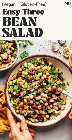 vegan and gluten - free bean salad recipe in a bowl with two hands