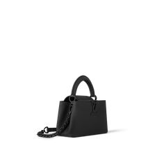 LOUIS VUITTON® - Capucines East-west Mini - All Black Mini Black Bag, Tas Louis Vuitton, Capucines Mini, Louis Vuitton Capucines, Model Features, Compact Wallet, Mini Handbag, Louis Vuitton Official, Mini Handbags