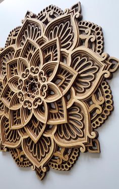 an intricately carved wooden piece on the wall