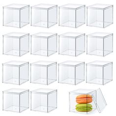 twelve clear boxes with carrots and cucumbers in them