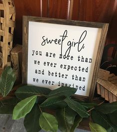 a sign that says, sweet girl you are more than we ever expected and better than we ever happened