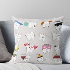 a white pillow with many different types of toothbrushes on it