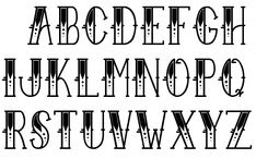 the upper and lower case of an old fashioned font with dots in black on a white background