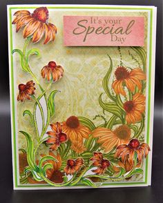 a handmade card with orange flowers and green leaves on it's side, says it's your special day