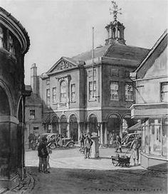 an old black and white photo of people in front of a building with a clock tower