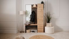 a room with a mirror, stool and plant on the floor in front of it