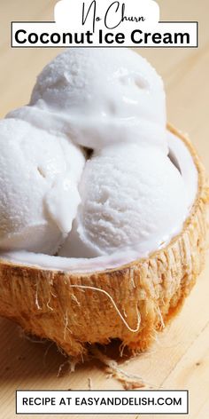 coconut ice cream in a coconut shell on a wooden table with text overlay that reads nourish coconut ice cream recipe