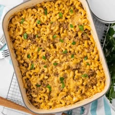 a casserole dish filled with macaroni and cheese