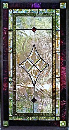 a stained glass window with an intricate design