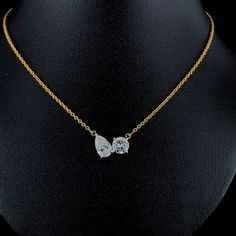 Romantic yet chic, this toi et moi design features Pear-shaped and Round-cut white Diamonds in an eye-catching, on-trend look. This exquisite two-stone Pendant, featuring a harmonious blend of shapes. The brilliant-cut diamonds are set in a lustrous gold, perfectly crafted to catch the light at every angle. Whether you're celebrating a special occasion or adding sophistication to your everyday ensemble, this Pendant to make a statement. ◆ F U L L  D E T A I L S ➺ Karat: 14k ➺ Gold Color: Yellow Pear Shaped Diamond Pendant, Gold Pear-shaped Diamond Necklace For Anniversary, Gold Marquise Solitaire Necklace For Wedding, White Briolette Diamond Necklace For Wedding, Yellow Gold Pear-shaped Necklace For Anniversary, Yellow Gold Pear-shaped Necklace For Wedding, Pear-shaped Yellow Gold Necklace For Anniversary, Pear-shaped Yellow Gold Anniversary Necklace, Pear-shaped Diamond Cut White Necklace