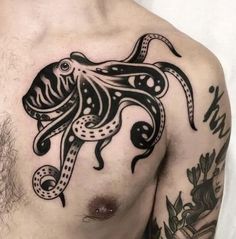 a man with an octopus tattoo on his chest